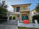 Two-story house with front yard