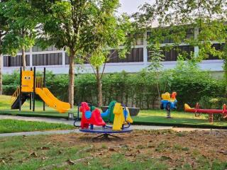 Playground with various equipment and greenery