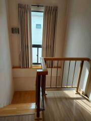 Staircase with window and natural light