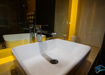 Modern bathroom sink with bright lighting