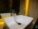 Modern bathroom sink with bright lighting