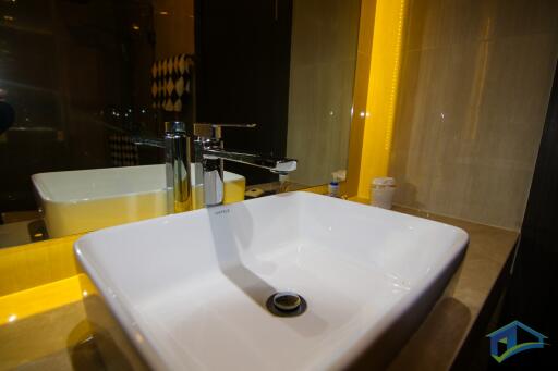 Modern bathroom sink with bright lighting