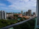 Scenic city and ocean view from a balcony