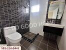 Modern bathroom with tiled walls and floor