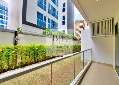 Modern apartment balcony with glass railing