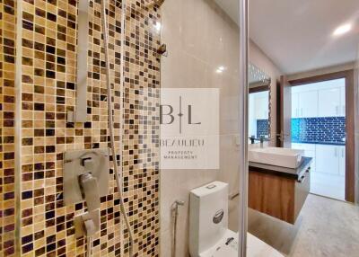 Modern bathroom with tiled shower