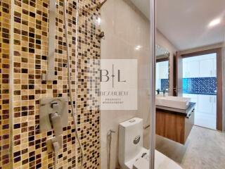 Modern bathroom with tiled shower