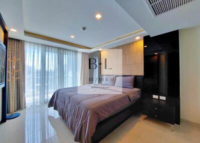 Modern bedroom with large window and bed