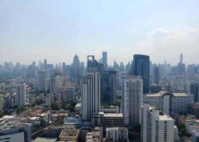 View of a city skyline with numerous buildings and high-rises