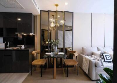 Modern living space with kitchen and dining area