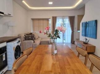 Living room with dining area and modern decor