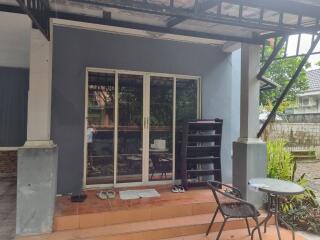 Patio with sliding doors and seating area