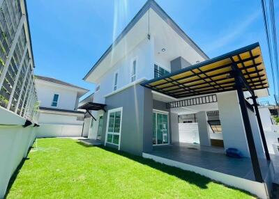 Modern two-story house with garden