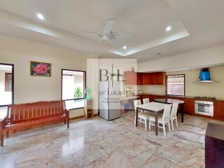 Spacious kitchen and dining area with modern fixtures