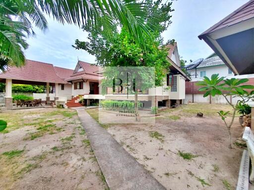 Exterior view of a residential property with a garden