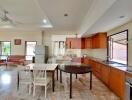 Spacious kitchen with dining area