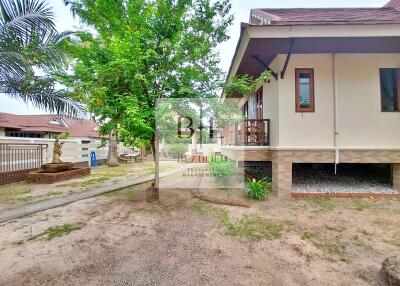 Exterior view of a house with a garden