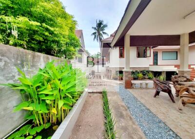 Outdoor area with garden and seating area