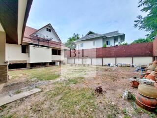 Backyard view with surrounding houses