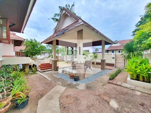 Outdoor space with gazebo and garden