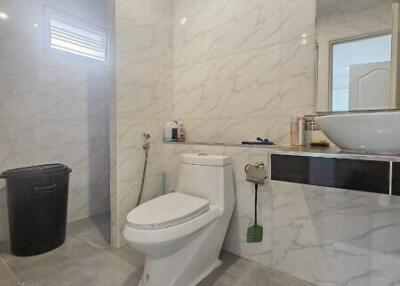 Modern bathroom with toilet and sink