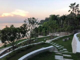 Garden with seating areas overlooking a lake