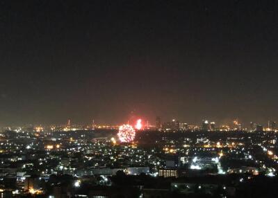 Night view of cityscape with fireworks