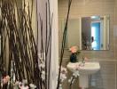 Bathroom with modern fixtures and floral decor