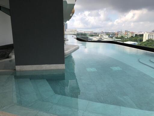 Infinity pool with cityscape view