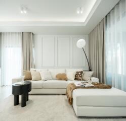 Modern living room with white sofa and floor lamp