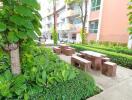 Outdoor sitting area with greenery and pathway