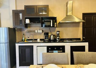 well-equipped kitchen with modern appliances