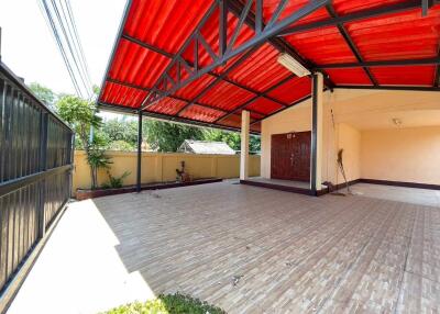 Covered outdoor area with red roof