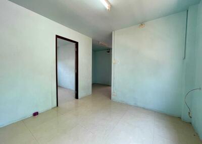 Empty room with tiled floor