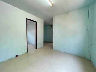 Empty room with tiled floor