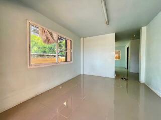 Empty living room with large window