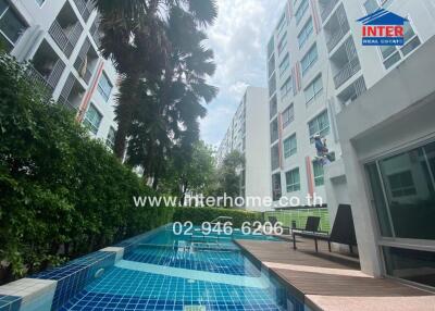 Outdoor view of a building with a swimming pool