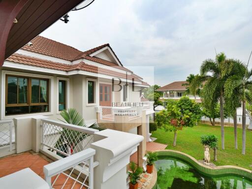 View of the building with balcony and garden area