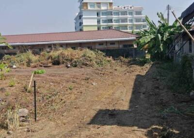 Vacant lot with surrounding buildings