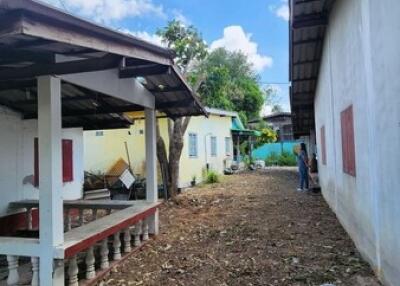 Outdoor area with covered patio and building exterior