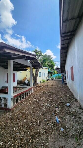 Outdoor area with covered patio and building exterior