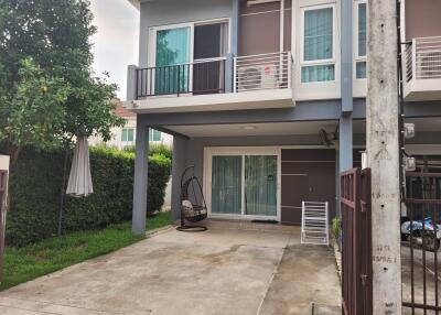 Front view of a modern two-story house with driveway