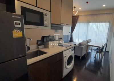 Modern kitchen area with integrated appliances