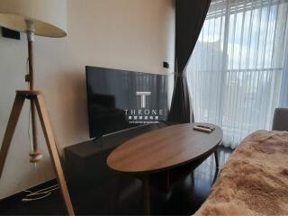 Living room with TV and natural light