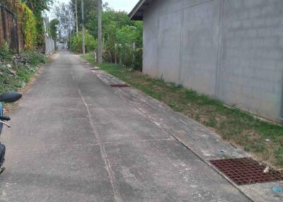 Narrow side street beside a building