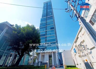 Modern high-rise apartment building with glass windows