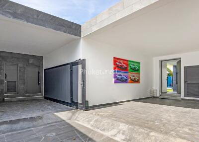 Modern garage area with artworks on the wall