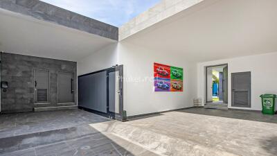 Modern garage area with artworks on the wall