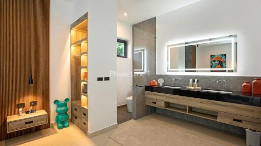 Modern bathroom with dual sinks and large mirror