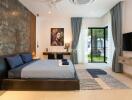 Modern bedroom with large bed, wall art, and TV